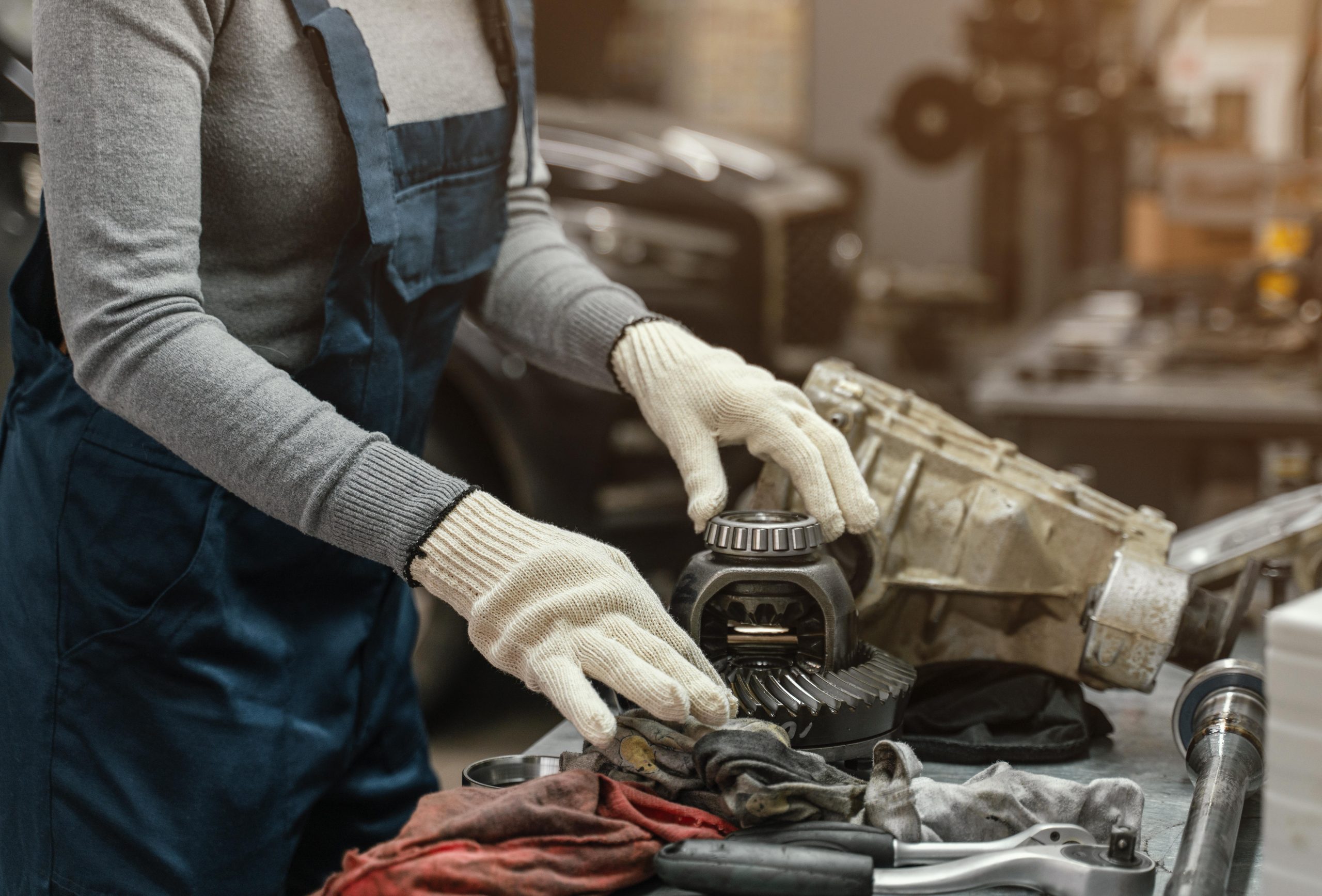 sideways-woman-working-car-service